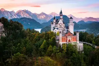 Schloss Neuschwanstein bei Sonnenuntergang Schloss Neuschwanstein bei Sonnenuntergang