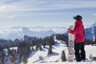 Snowboarderin an der Kampenwand