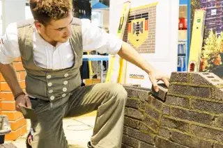 Handwerker auf der Messe Bau Handwerker auf der Messe Bau