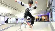 Trendsport Actionsport Kind auf Skateboard