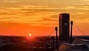Sonnensichel beim Untergang - Bild vom Olympiaberg